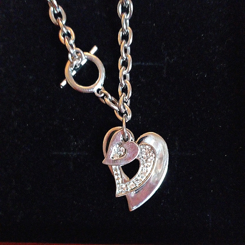 Silver tone heart Bracelet.